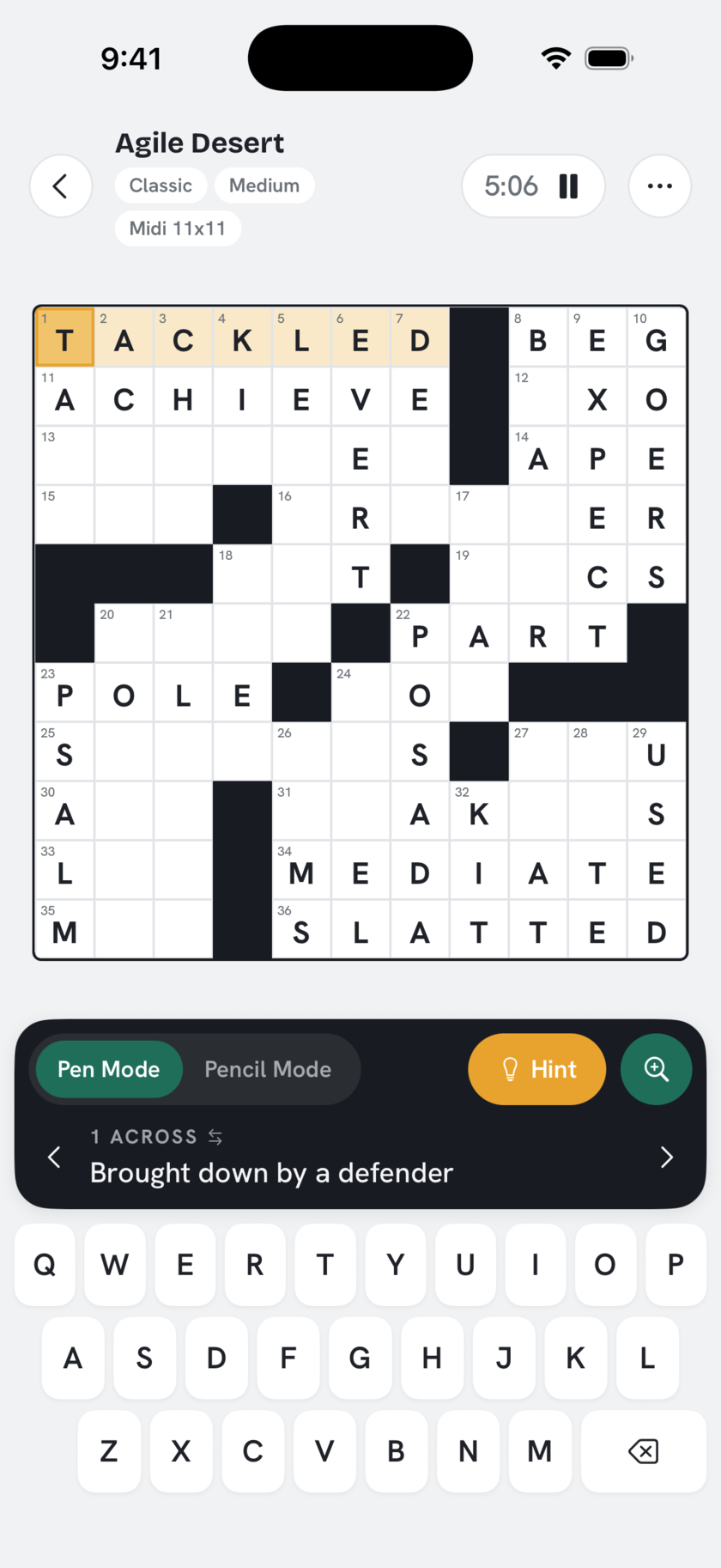 The solver mid-puzzle: a grid partly filled, the current clue highlighted, keyboard below